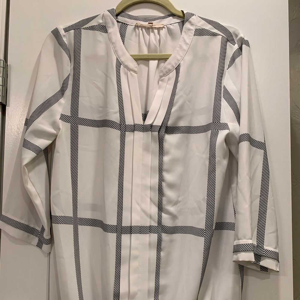 Windowpane pattern blouse